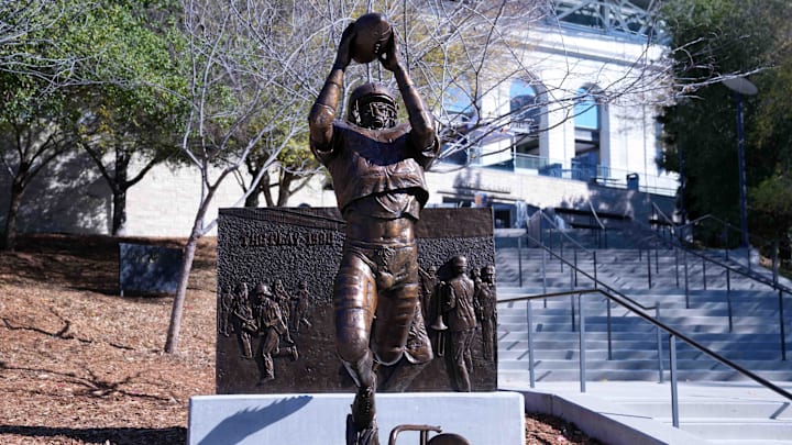 A statue of California Golden Bears player Kevin Moen at California Memorial Stadium commemorates the 1982 Cal-Stanford rivalry game. 