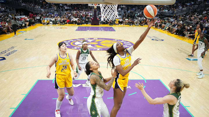 Sep 11, 2024; Los Angeles, California, USA: LA Sparks forward Rickea Jackson (2) shoots the ball against Seattle Storm forward Gabby Williams (5) and guard Sami Whitcomb (32) in the second half at Crypto.com Arena. Mandatory Credit: Kirby Lee-Imagn Images