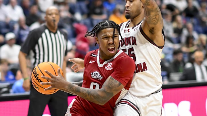 Mar 14, 2024; Nashville, TN, USA; Arkansas Razorbacks guard Khalif Battle (0) drives past South