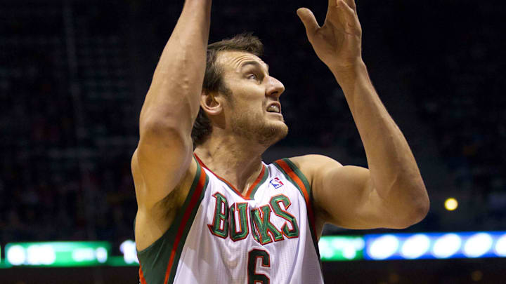 Dec 27, 2011; Milwaukee, WI, USA: Milwaukee Bucks center Andrew Bogut (6) shoots during the game against the Minnesota Timberwolves at the Bradley Center.  The Bucks defeated the Timberwolves 98-95.  Mandatory Credit: Jeff Hanisch-Imagn Images