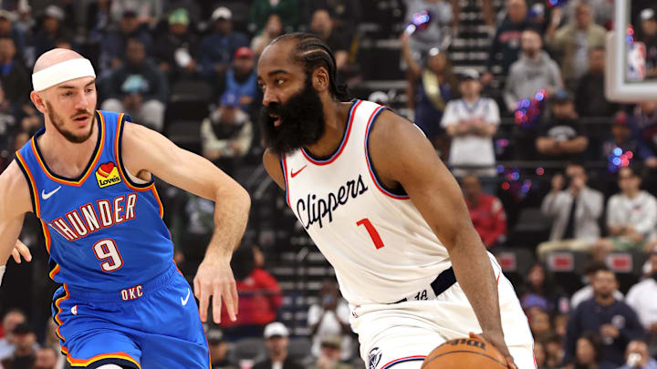 Mar 23, 2025; Inglewood, California, USA; LA Clippers guard James Harden (1) dribbles against Oklahoma City Thunder guard Alex Caruso (9) during the 1st quarter at Intuit Dome. Mandatory Credit: Jason Parkhurst-Imagn Images Mar 23, 2025; Inglewood, California, USA; LA Clippers guard James Harden (1) dribbles against Oklahoma City Thunder guard Alex Caruso (9) during the 1st quarter at Intuit Dome. Mandatory Credit: Jason Parkhurst-Imagn Images