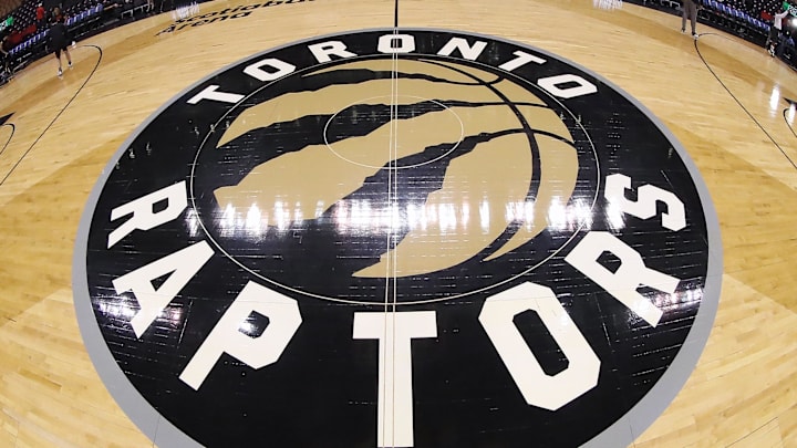 Mar 1, 2019; Toronto, Ontario, CAN; A general view of the Toronto Raptors logo at center court before the start of a game between the Raptors and the Portland Trail Blazers at Scotiabank Arena. Mandatory Credit: Tom Szczerbowski-Imagn Images