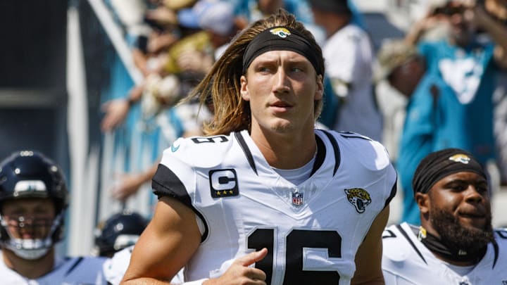 Sep 24, 2023; Jacksonville, Florida, USA; Jacksonville Jaguars quarterback Trevor Lawrence (16) runs out of the tunnel before the game against the Houston Texans at EverBank Stadium. Mandatory Credit: Morgan Tencza-Imagn Images