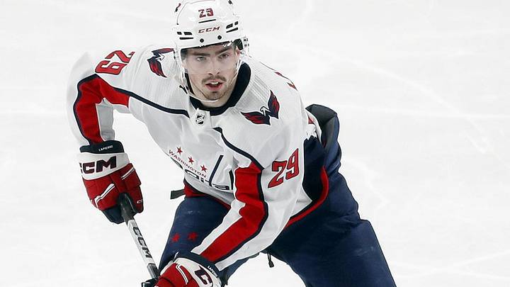 Mar 7, 2024; Pittsburgh, Pennsylvania, USA; Washington Capitals center Hendrix Lapierre (29) skates up ice with the puck against the Pittsburgh Penguins during the third period at PPG Paints Arena. The Capitals shutout the Penguins 6-0. Mandatory Credit: Charles LeClaire-Imagn Images