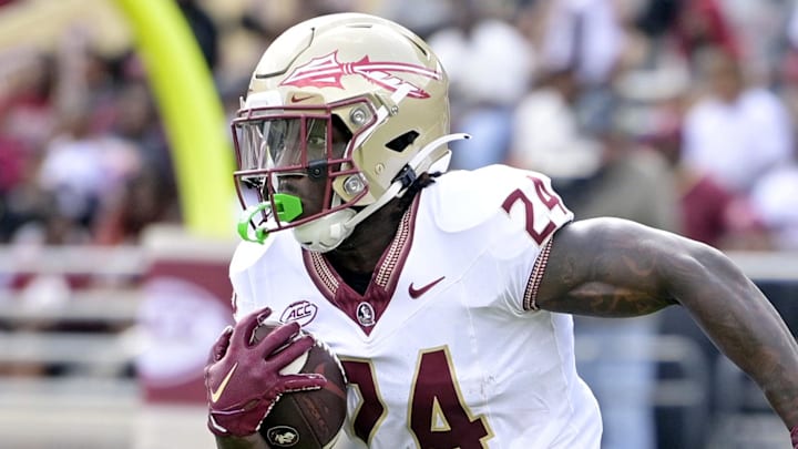 Apr 20, 2024; Tallahassee, Florida, USA; Florida State Seminoles running back Roydell Williams (24) runs the ball during the Spring Showcase at Doak S. Campbell Stadium. Mandatory Credit: Melina Myers-Imagn Images