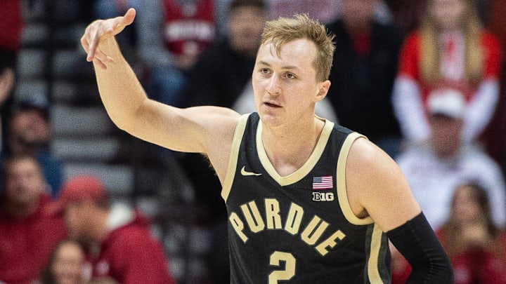 Purdue's Fletcher Loyer (2) shows three fingers after making a three-pointer.