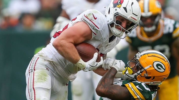 Arizona Cardinals tight end Trey McBride (85) stiff-arms Green Bay Packers safety Javon Bullard during their game in 2024. Arizona Cardinals tight end Trey McBride (85) stiff-arms Green Bay Packers safety Javon Bullard during their game in 2024.