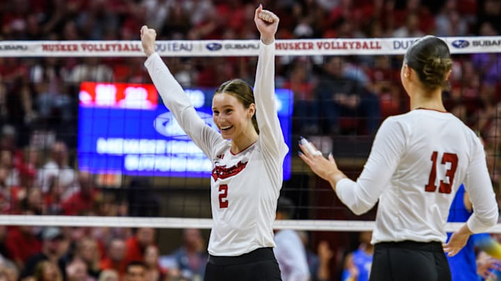 Bergen Reilly celebrates a UCLA service error. 