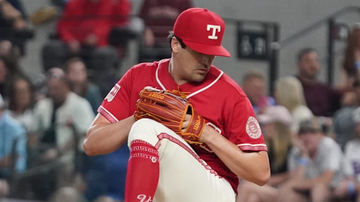 Texas Rangers pitcher Cal Quantrill prepares to throw a baseball.