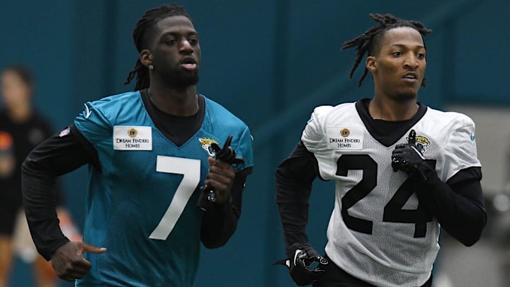 Jacksonville Jaguars wide receiver Brian Thomas (7), and cornerback De'Antre Prince (24) run sprints