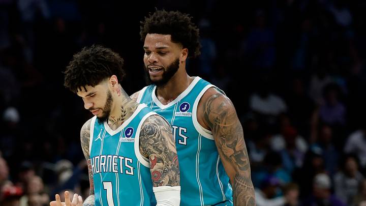 Charlotte Hornets forward Miles Bridges (0) celebrates with guard LaMelo Ball Charlotte Hornets forward Miles Bridges (0) celebrates with guard LaMelo Ball