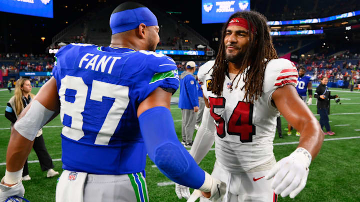 Oct 10, 2024; Seattle, Washington, USA; Seattle Seahawks tight end Noah Fant (87) and San Francisco 49ers linebacker Fred Warner (54) after the game at Lumen Field. 