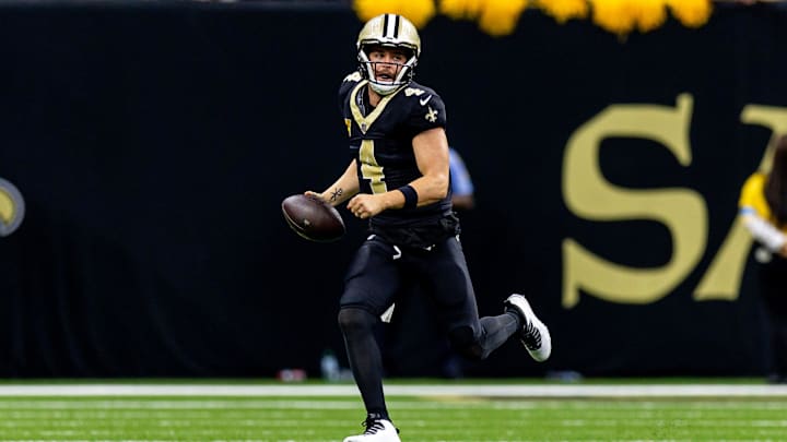 Nov 10, 2024; New Orleans, Louisiana, USA; New Orleans Saints quarterback Derek Carr (4) scrambles out the pocket against the Atlanta Falcons during the second half at Caesars Superdome. Mandatory Credit: Stephen Lew-Imagn Images Nov 10, 2024; New Orleans, Louisiana, USA; New Orleans Saints quarterback Derek Carr (4) scrambles out the pocket against the Atlanta Falcons during the second half at Caesars Superdome. Mandatory Credit: Stephen Lew-Imagn Images