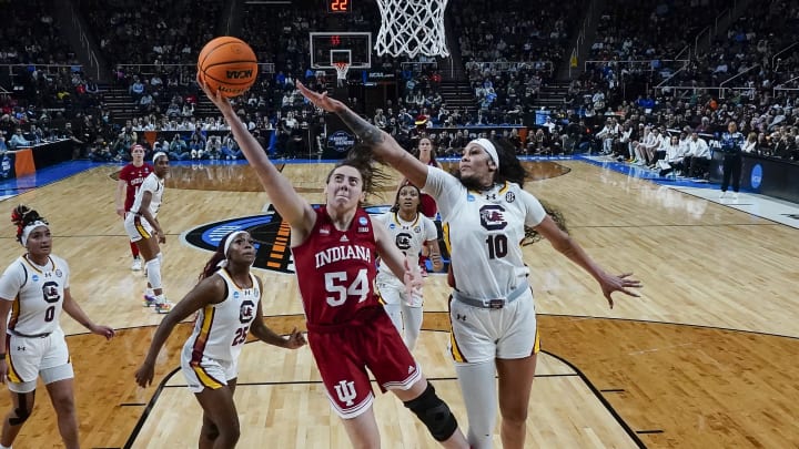 Mar 29, 2024; Albany, NY, USA; Indiana Hoosiers forward Mackenzie Holmes (54) shoots a layup against South Carolina center Kamilla Cardoso.