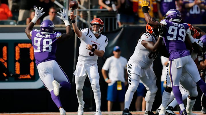 Bengals quarterback Joe Burrow makes a pass in overtime on Sunday.

Minnesota Vikings At Cincinnati Bengals