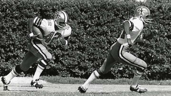 Sep 17, 1967; New Orleans, LA, USA; FILE PHOTO; New Orleans Saints receiver John Gilliam (42) runs back a kick-off against the Los Angles Rams at Tulane Stadium. The Rams beat the Saints 27-13. Mandatory Credit: Malcolm Emmons- USA TODAY Sports Sep 17, 1967; New Orleans, LA, USA; FILE PHOTO; New Orleans Saints receiver John Gilliam (42) runs back a kick-off against the Los Angles Rams at Tulane Stadium. The Rams beat the Saints 27-13. Mandatory Credit: Malcolm Emmons- USA TODAY Sports