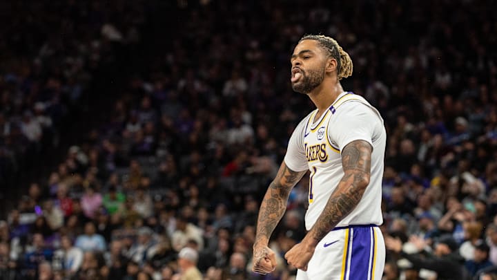 Dec 21, 2024; Sacramento, California, USA; Los Angeles Lakers guard D'Angelo Russell (1) flexes after scoring against the Sacramento Kings during the fourth quarter at Golden 1 Center. Mandatory Credit: Ed Szczepanski-Imagn Images