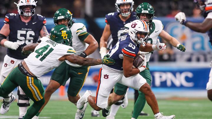 Auburn running back Jeremiah Cobb (23) scored the team's first touchdown of the season on a 15-yard scamper. Auburn running back Jeremiah Cobb (23) scored the team's first touchdown of the season on a 15-yard scamper.