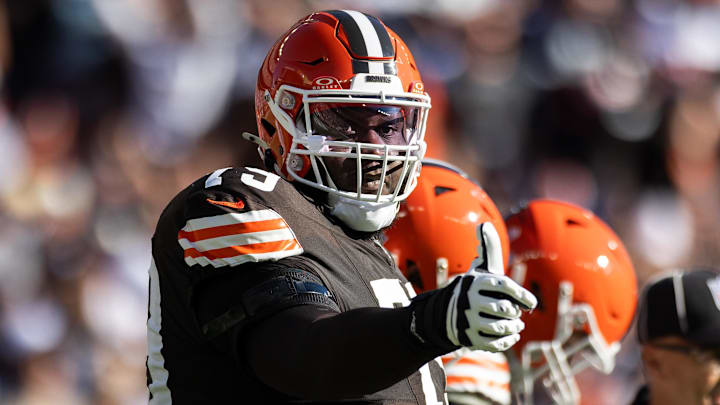 Sep 8, 2024; Cleveland, Ohio, USA; Cleveland Browns offensive tackle Dawand Jones (79) gives a thumbs up as he heads to the line of scrimmage against the Dallas Cowboys during the second quarter at Huntington Bank Field. Mandatory Credit: Scott Galvin-Imagn Images