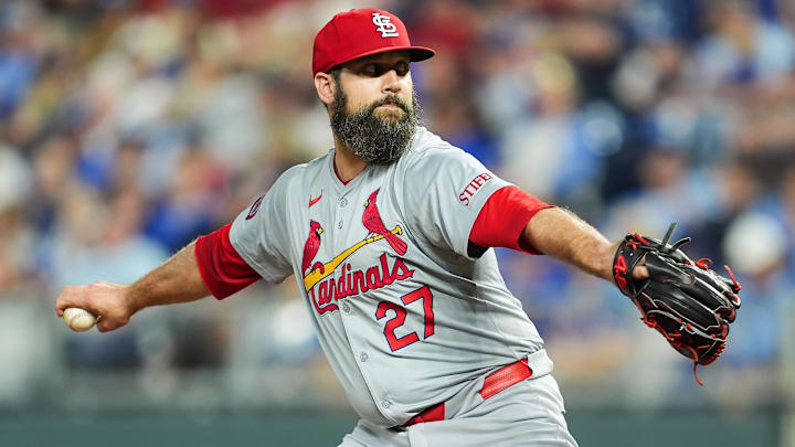 Aug 9, 2024; Kansas City, Missouri, USA; St. Louis Cardinals relief pitcher Andrew Kittredge (27) pitches during the eighth inning against the Kansas City Royals at Kauffman Stadium.