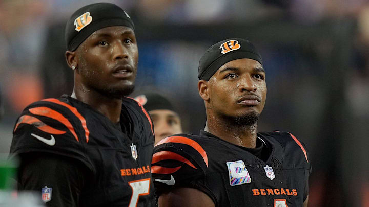 Cincinnati Bengals wide receiver Tee Higgins (5) and wide receiver Ja'Marr Chase (1) watch the score board as their team lose to the Detroit Lions 24-37 at Paycor Stadium on October 5, 2025. Cincinnati Bengals wide receiver Tee Higgins (5) and wide receiver Ja'Marr Chase (1) watch the score board as their team lose to the Detroit Lions 24-37 at Paycor Stadium on October 5, 2025.