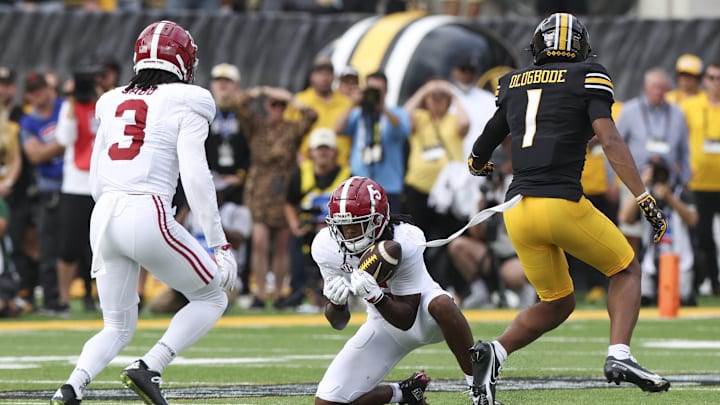 Oct 11, 2025; Columbia, Missouri, USA; Alabama Crimson Tide defensive back Dijon Lee Jr. (5) intercepts a pass intended for Missouri Tigers wide receiver Donovan Olugbode (1) during the fourth quarter at Faurot Field at Memorial Stadium. Mandatory Credit: Reese Strickland-Imagn Images Oct 11, 2025; Columbia, Missouri, USA; Alabama Crimson Tide defensive back Dijon Lee Jr. (5) intercepts a pass intended for Missouri Tigers wide receiver Donovan Olugbode (1) during the fourth quarter at Faurot Field at Memorial Stadium. Mandatory Credit: Reese Strickland-Imagn Images
