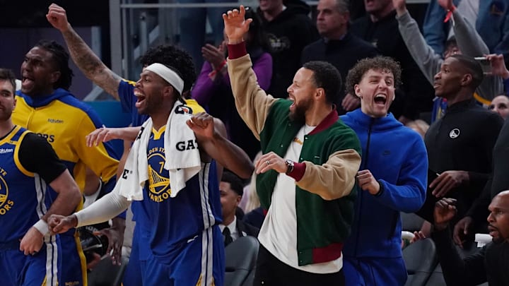 Jan 4, 2025; San Francisco, California, USA; Golden State Warriors guard Buddy Hield, guard Stephen Curry, and guard Brandin Podziemski celebrate after the Warriors scored against the Memphis Grizzlies in the fourth quarter at Chase Center. Mandatory Credit: David Gonzales-Imagn Images Jan 4, 2025; San Francisco, California, USA; Golden State Warriors guard Buddy Hield, guard Stephen Curry, and guard Brandin Podziemski celebrate after the Warriors scored against the Memphis Grizzlies in the fourth quarter at Chase Center. Mandatory Credit: David Gonzales-Imagn Images