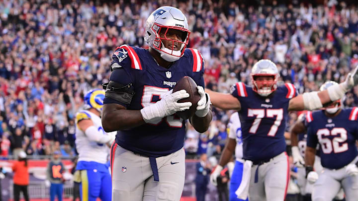 Nov 17, 2024; Foxborough, Massachusetts, USA;  New England Patriots offensive tackle Vederian Lowe (59) reacts to his touchdown against the Los Angeles Rams during the second half at Gillette Stadium. Mandatory Credit: Eric Canha-Imagn Images