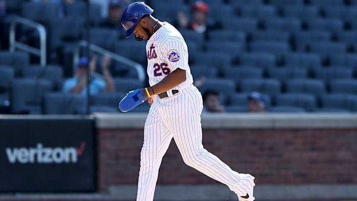 Khalil Lee rounds the bases against the Colorado Rockies.