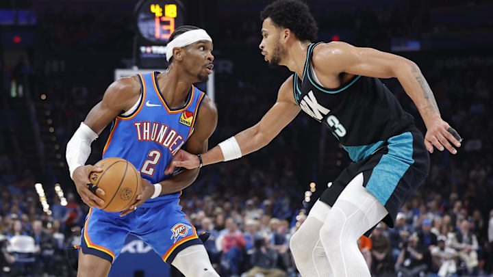 Dec 31, 2025; Oklahoma City, Oklahoma, USA; Oklahoma City Thunder guard Shai Gilgeous-Alexander (2) drives against Portland Trail Blazers forward Toumani Camara (33) during the second half at Paycom Center. Mandatory Credit: Alonzo Adams-Imagn Images Dec 31, 2025; Oklahoma City, Oklahoma, USA; Oklahoma City Thunder guard Shai Gilgeous-Alexander (2) drives against Portland Trail Blazers forward Toumani Camara (33) during the second half at Paycom Center. Mandatory Credit: Alonzo Adams-Imagn Images