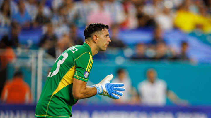 Jun 29, 2024; Miami, FL, USA;  Argentina goalkeeper Emiliano Martínez (23) looks on against Peru in the first half during the Copa America group stage at Hard Rock Stadium. Mandatory Credit: Nathan Ray Seebeck-Imagn Images