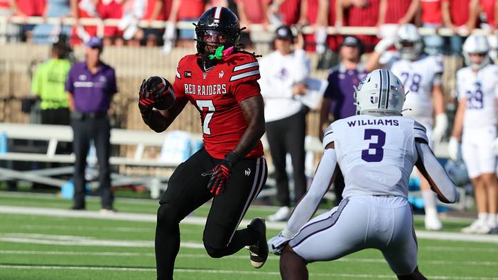 Sep 5, 2026; Lubbock, Texas, USA; Texas Tech Red Raiders tight end Terrance Carter Jr. (7) rushes against Abilene Christian Wildcats defensive back Dillon Williams (3) in the first half at Galaxy Stadium. Mandatory Credit: Michael C. Johnson-Imagn Images Sep 5, 2026; Lubbock, Texas, USA; Texas Tech Red Raiders tight end Terrance Carter Jr. (7) rushes against Abilene Christian Wildcats defensive back Dillon Williams (3) in the first half at Galaxy Stadium. Mandatory Credit: Michael C. Johnson-Imagn Images