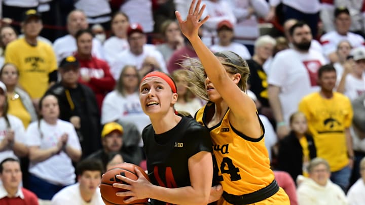Feb 22, 2024; Bloomington, Indiana, USA; Indiana Hoosiers guard Sara Scalia (14) pushes past Iowa.