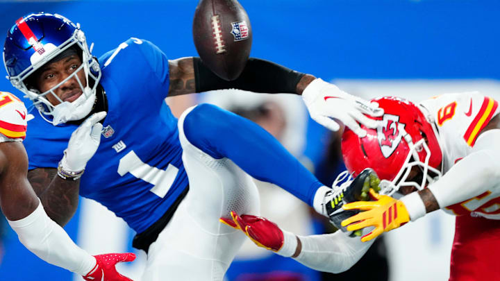 New York Giants wide receiver Malik Nabers (1) looks at a ball that was meant for him as he gets ready to fall in the end zone, in the fourth quarter, Sunday, September 21, 2025. Kansas City Chiefs cornerback Nohl Williams (20) and Kansas City Chiefs safety Bryan Cook (6) is shown on Nabers' sides. New York Giants wide receiver Malik Nabers (1) looks at a ball that was meant for him as he gets ready to fall in the end zone, in the fourth quarter, Sunday, September 21, 2025. Kansas City Chiefs cornerback Nohl Williams (20) and Kansas City Chiefs safety Bryan Cook (6) is shown on Nabers' sides.