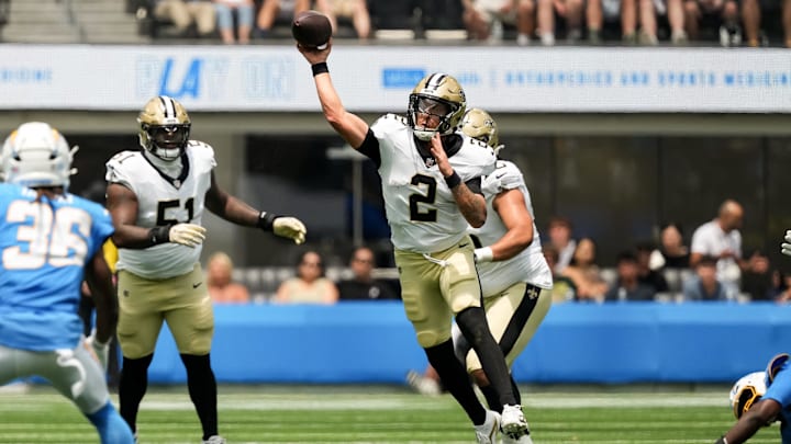 Aug 10, 2025; Inglewood, California, USA; New Orleans Saints quarterback Spencer Rattler (2) throws a pass during the first quarter against the Los Angeles Chargers at SoFi Stadium. Mandatory Credit: Jon Endow-Imagn Images