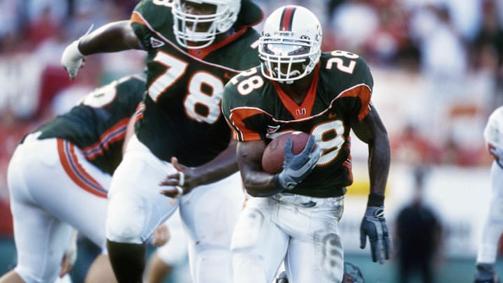 Unknown Date; Miami, FL, USA; FILE PHOTO; Miami Hurricanes running back Clinton Portis (28) in action at the Orange Bowl. Mandatory Credit: Paul Chapman-Imagn Images