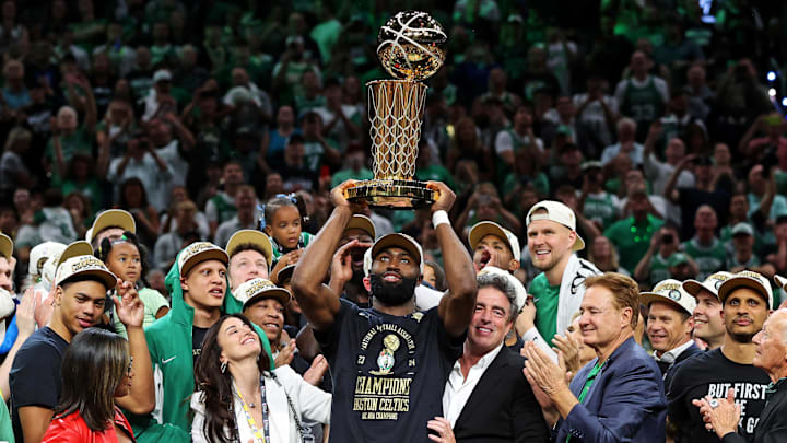 Jun 17, 2024; Boston, Massachusetts, USA; Boston Celtics guard Jaylen Brown (7) celebrates with the Larry O’Brien Trophy after beating the Dallas Mavericks in game five of the 2024 NBA Finals to win the NBA Championship at TD Garden. Mandatory Credit: Peter Casey-Imagn Images