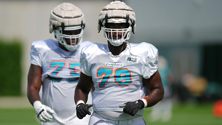 Aug 3, 2022; Miami Gardens, Florida, US; Miami Dolphins tackle Kion Smith (76) and Greg Little (75)
