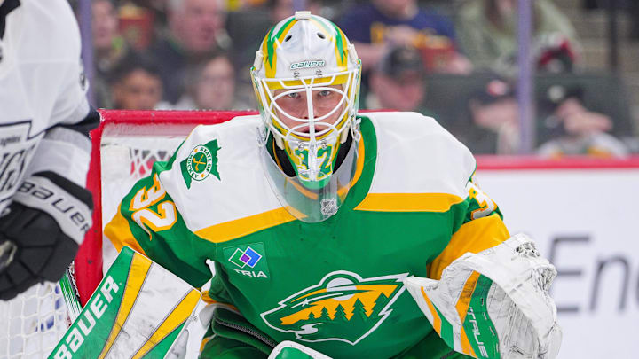 Mar 17, 2025; Saint Paul, Minnesota, USA;  Minnesota Wild goaltender Filip Gustavsson (32) watches the puck against the Los Angeles Kings in the second period at Xcel Energy Center. Mandatory Credit: Brad Rempel-Imagn Images