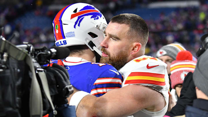 Jan 21, 2024; Orchard Park, New York, USA; Kansas City Chiefs tight end Travis Kelce (87) reacts with Buffalo Bills quarterback Josh Allen (17) after the 2024 AFC divisional round game at Highmark Stadium. Mandatory Credit: Mark Konezny-Imagn Images