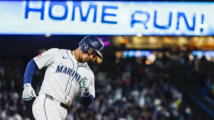 Seattle Mariners third baseman Jorge Polanco runs after hitting a home run against the Athletics on March 27 at T-Mobile Park. Seattle Mariners third baseman Jorge Polanco runs after hitting a home run against the Athletics on March 27 at T-Mobile Park.