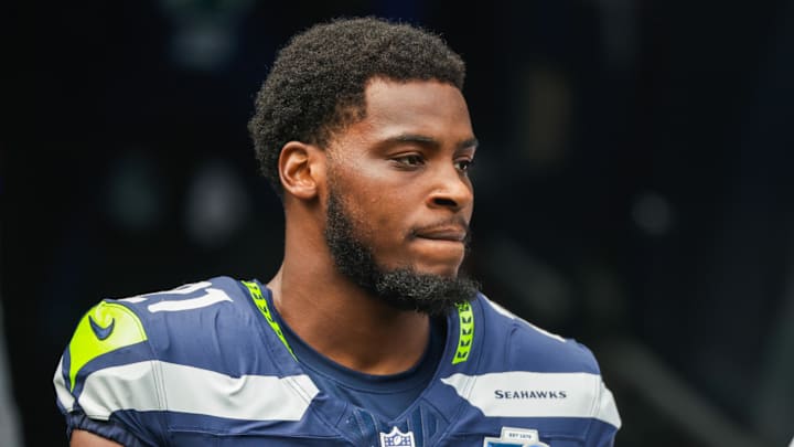 Sep 7, 2025; Seattle, Washington, USA; Seattle Seahawks cornerback Devon Witherspoon (21) stands outside the tunnel during player introductions against the San Francisco 49ers at Lumen Field.