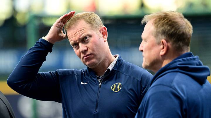 Oct 2, 2024; Milwaukee, Wisconsin, USA; Milwaukee Brewers general manager Matt Arnold talks to manager Matt Arnold before game two of the Wildcard round for the 2024 MLB Playoffs against the New York Mets at American Family Field. Mandatory Credit: Benny Sieu-Imagn Images Oct 2, 2024; Milwaukee, Wisconsin, USA; Milwaukee Brewers general manager Matt Arnold talks to manager Matt Arnold before game two of the Wildcard round for the 2024 MLB Playoffs against the New York Mets at American Family Field. Mandatory Credit: Benny Sieu-Imagn Images