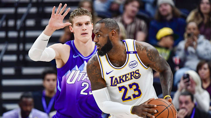Dec 1, 2024; Salt Lake City, Utah, USA; Utah Jazz forward/center Lauri Markkanen (23) defends Los Angeles Lakers forward LeBron James (23) during the first half at the Delta Center. Mandatory Credit: Christopher Creveling-Imagn Images