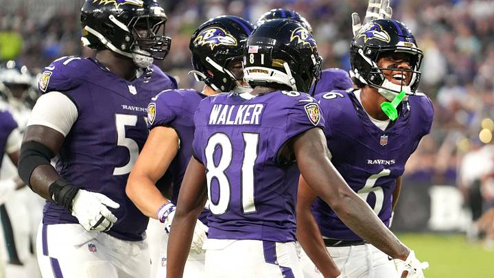 Ravens wide receiver Ja’Kobi Lane celebrates after catching a touchdown during the preseason opener against the Eagles.