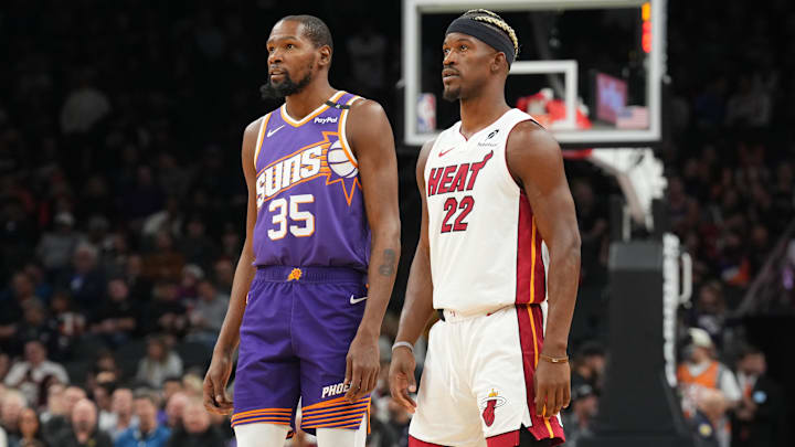 Durant and Butler stand on the court during a game in November 2024.