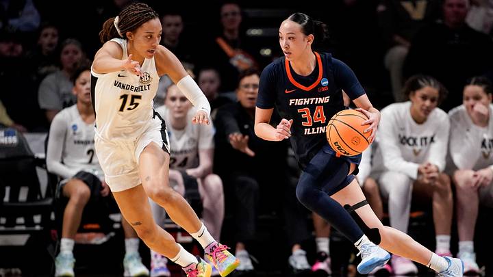 Illinois guard Maddie Webber (34) looks for a path past Vanderbilt guard Ndjakalenga Mwenentanda (15) during the first half of a second round NCAA college basketball tournament game at Memorial Gym in Nashville, Tenn., Monday, March 23, 2026.