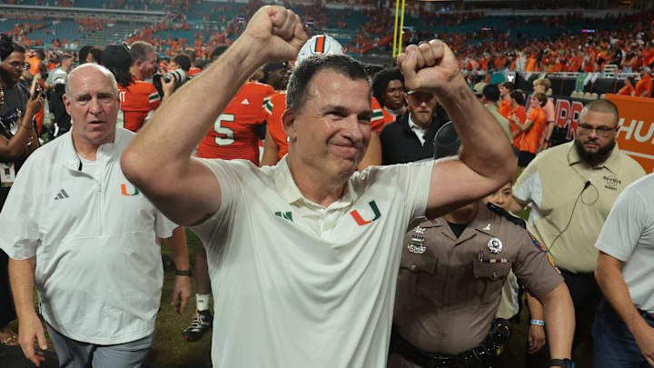 Aug 31, 2025; Miami Gardens, Florida, USA; Miami Hurricanes head coach Mario Cristobal reacts after defeating the Notre Dame Fighting Irish at Hard Rock Stadium. Mandatory Credit: Sam Navarro-Imagn Images