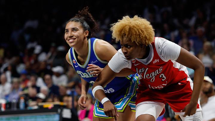 Jun 15, 2026; Arlington, Texas, USA; Dallas Wings guard Azzi Fudd (35) and Las Vegas Aces forward Nalyssa Smith (3) battle for position during the second half at College Park Center. Mandatory Credit: Chris Jones-Imagn Images