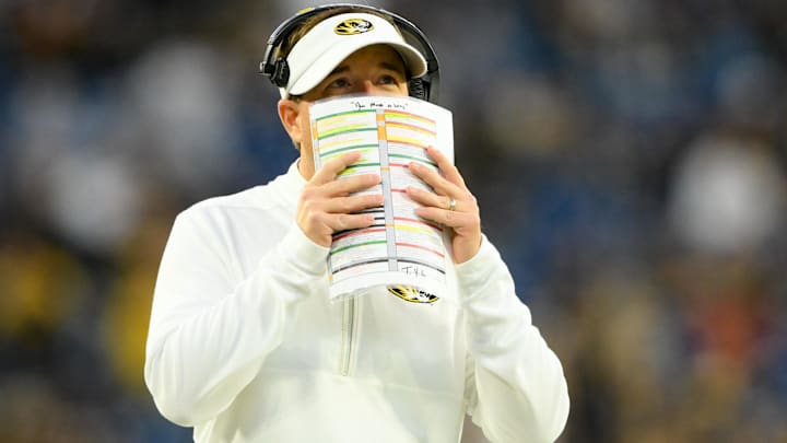 Dec 30, 2024; Nashville, TN, USA;  Missouri Tigers head coach Eliah Drinkwitz watches the clock against the Iowa Hawkeyes during the second half at Nissan Stadium. Mandatory Credit: Steve Roberts-Imagn Images